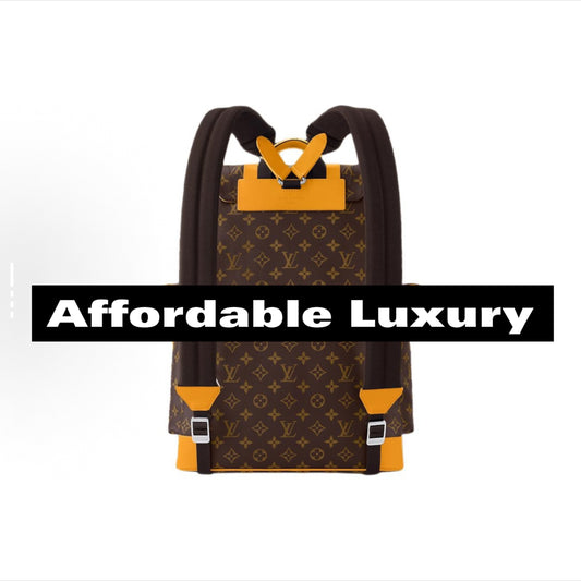 Alphabet snap-coated cowhide and canvas backpack