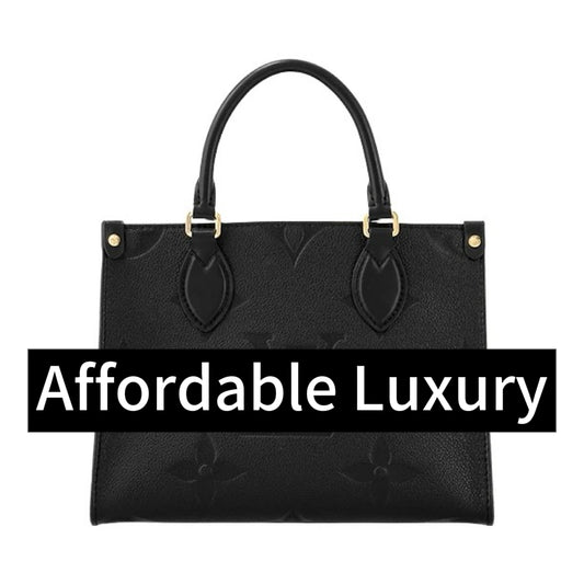 Small monogram embossed cowhide tote shoulder bag