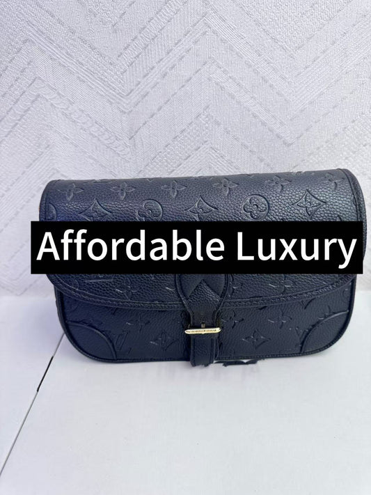 Embossed soft grain leather shoulder bag with hook closure